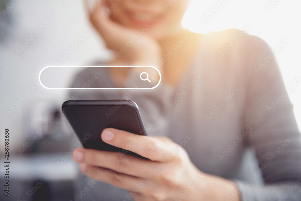 Closeup woman hands using mobile phone with Searching Browsing Internet Data Information Networking Concept, copy space. Closeup woman hands using mobile phone with Searching Browsing Internet Data Information Networking Concept, copy space.