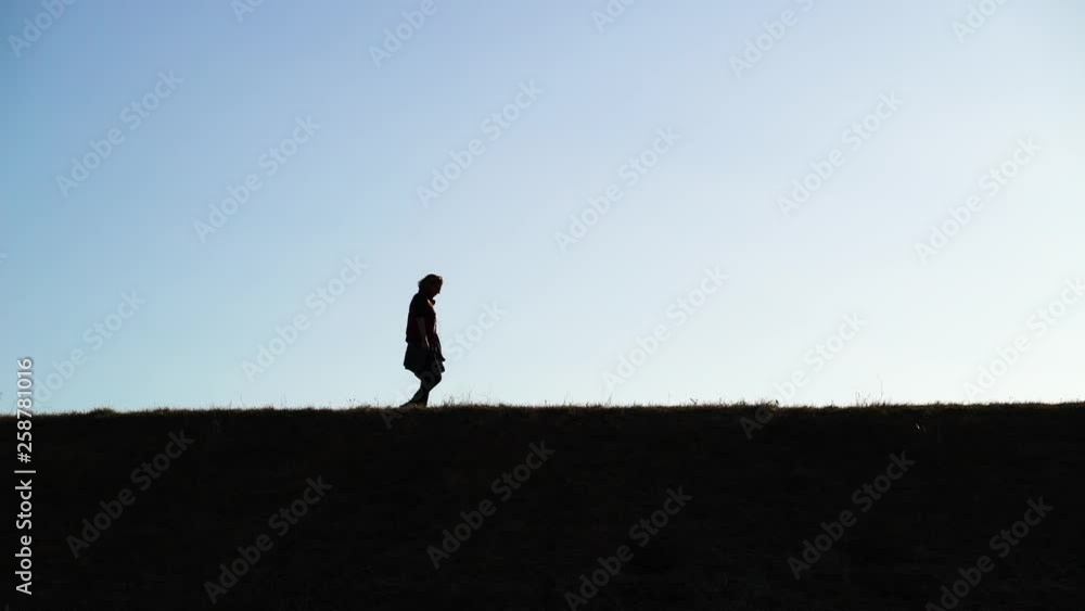 Shadow image of man walking alone at public park, Zagreb, Croatia. Shadow image of man walking alone at public park, Zagreb, Croatia.