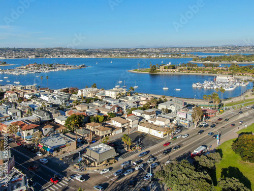 Aerial view of Mission Bay & Beaches in San Diego, California. USA. Community built on a sandbar with villas, sea port. & recreational Mission Bay Park. Californian beach-lifestyle.