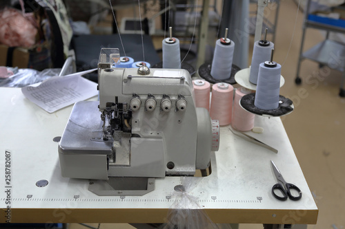 A small workshop for sewing clothes with professional equipment and tools