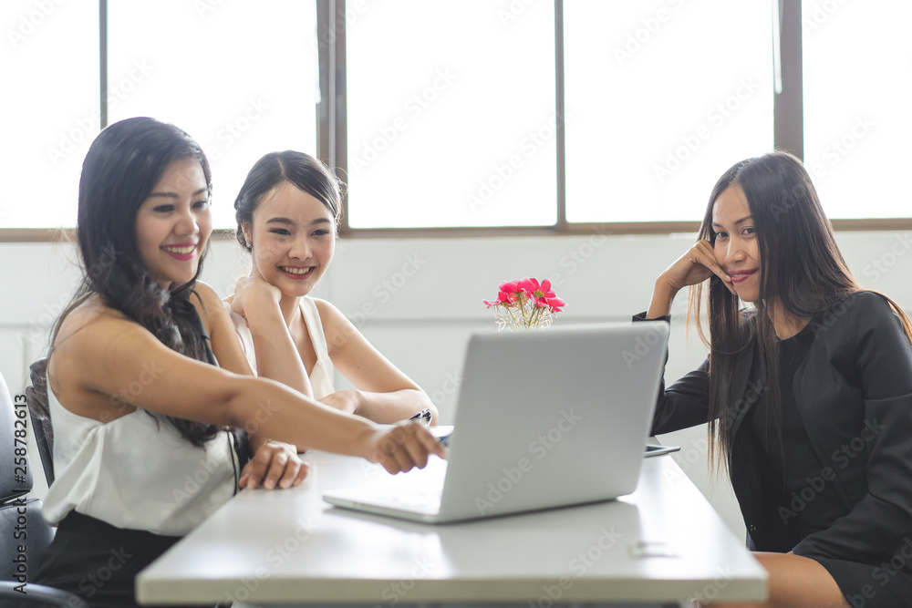 Group of business woman working in the office. Female boss brainstorming with her employees. Group of business woman working in the office. Female boss brainstorming with her employees.