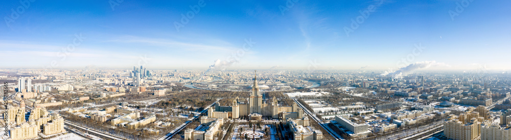 Aerial view of Lomonosov Moscow State University (MGU, MSU) on Sparrow Hills, Moscow, Russia. Panorama of Moscow with the Main building of University. Beautiful Moscow view from above in winter.