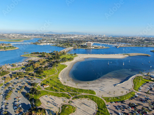 Aerial view of Mission Bay & Beaches in San Diego, California. USA. Community built on a sandbar with villas, sea port.  & recreational Mission Bay Park. Californian beach-lifestyle. photo