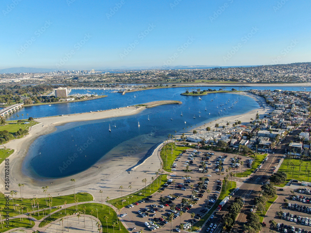 Aerial view of Mission Bay & Beaches in San Diego, California. USA. Community built on a sandbar with villas, sea port.  & recreational Mission Bay Park. Californian beach-lifestyle.