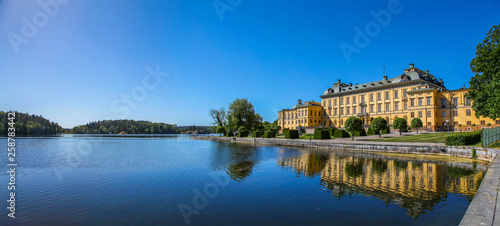 Stockholm’s Drottningholm Palace reflecting on the lake water