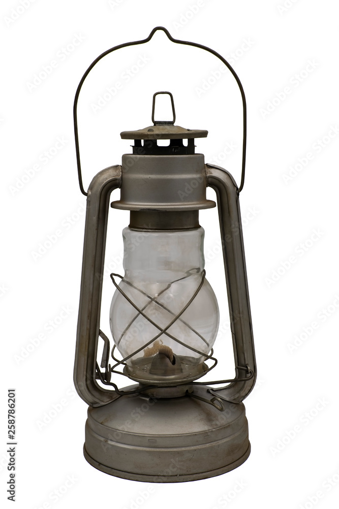 Old iron kerosene lamp. Isolate on a white background. Old iron kerosene lamp. Isolate on a white background.
