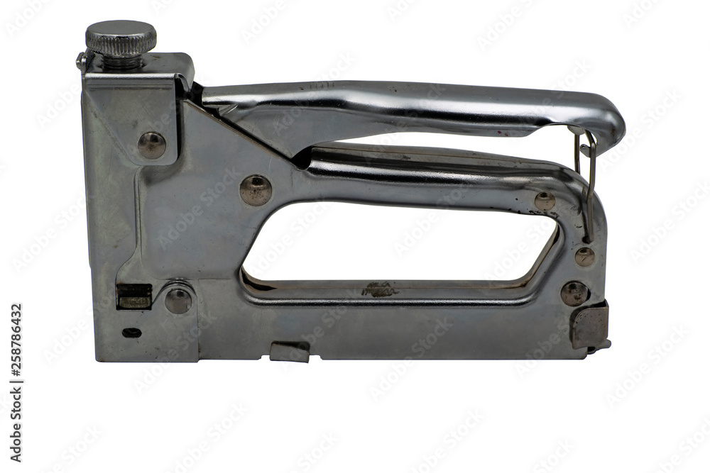 Steel furniture stapler. Isolate on white background. Steel furniture stapler. Isolate on white background.