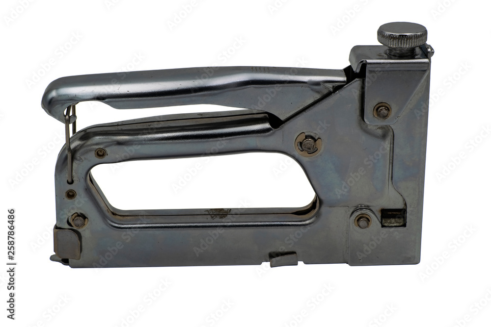 Steel furniture stapler. Isolate on white background. Steel furniture stapler. Isolate on white background.