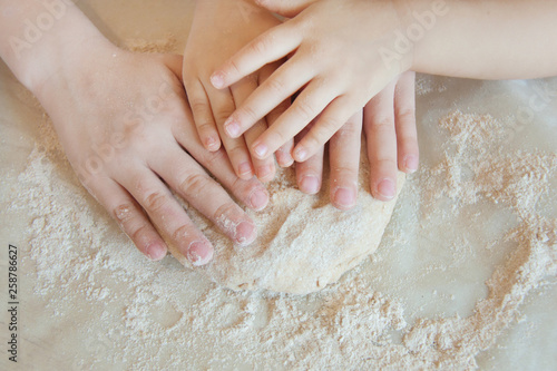 Concept preparing food with child in the kitchen, home leisure