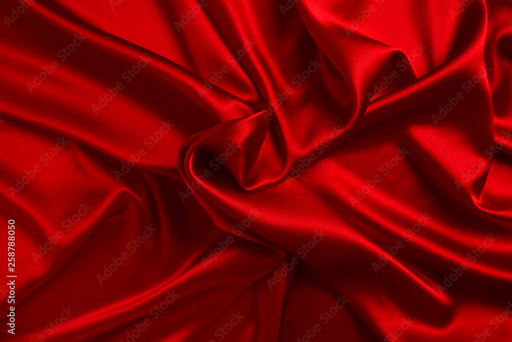 Fototapeta premium Red silk or satin luxury fabric texture can use as abstract background. Top view.