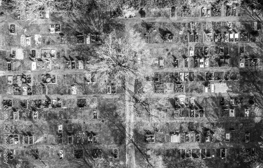 Aerial drone view of a church graveyard cemetary Germany black and white