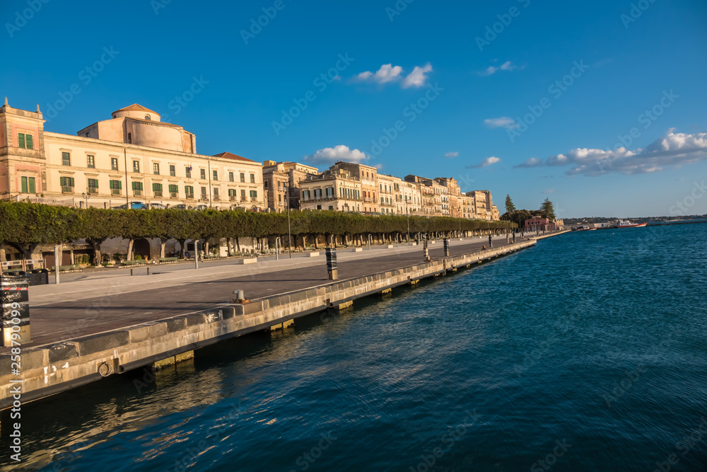 Western waterfront of Ortygia Island, Syracuse (Siracusa), a historic city on the island of Sicily, Italy. Notable for its rich Greek history, culture, amphitheatres, architecture