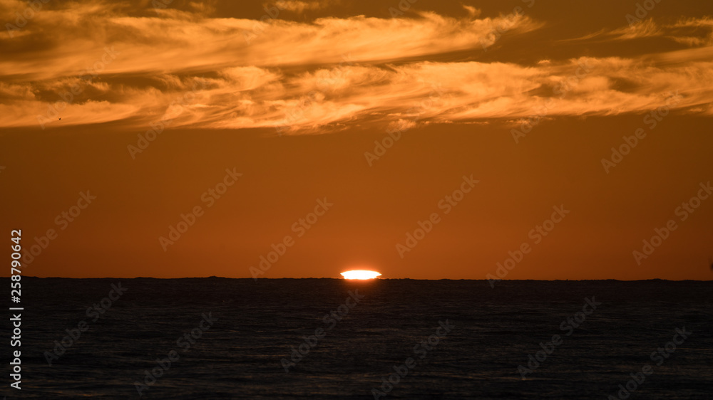 Green flash as the sun sets off the pacific coast in baja Mexico. 