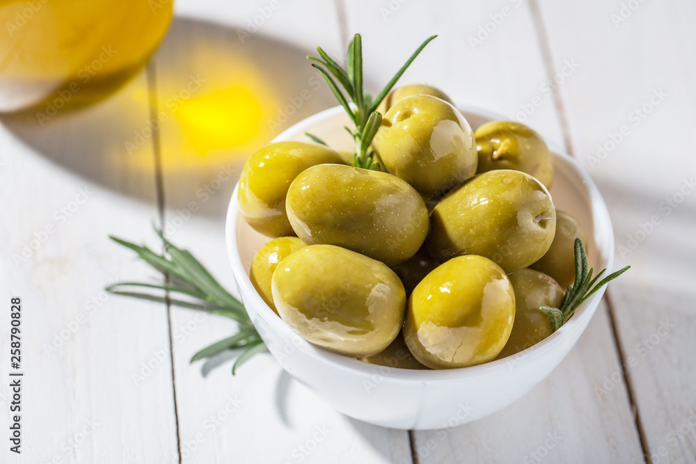 Bowl with canned olives on white background Bowl with canned olives on white background