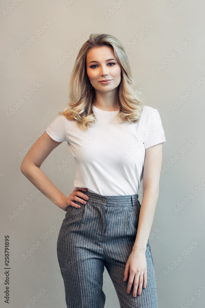 portrait of a young beautiful girl in a white t-shirt portrait of a young beautiful girl in a white t-shirt