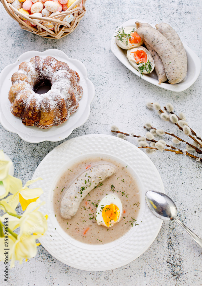 Easter breakfast. Sour rye soup with eggs and sausage