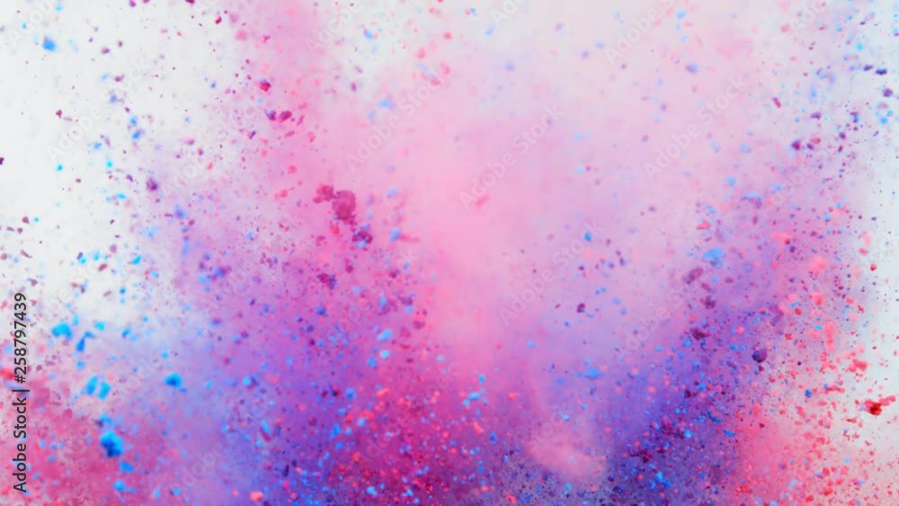 Super slowmotion shot of color powder explosion isolated on white background. Super slowmotion shot of color powder explosion isolated on white background.