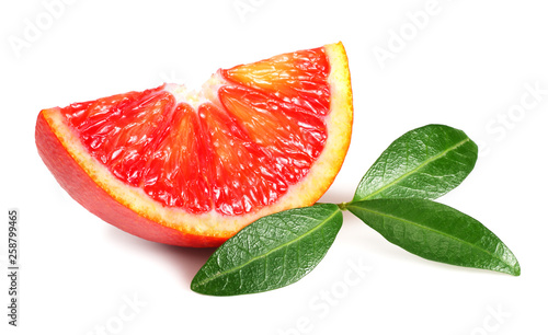 Slice of red blood orange with leaf isolated on white background