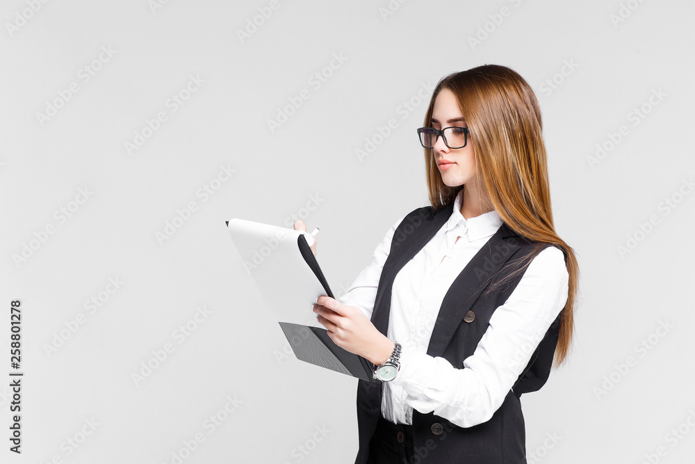 Blonde business woman hold paperboard isolated over white background. Copy space! Blonde business woman hold paperboard isolated over white background. Copy space!