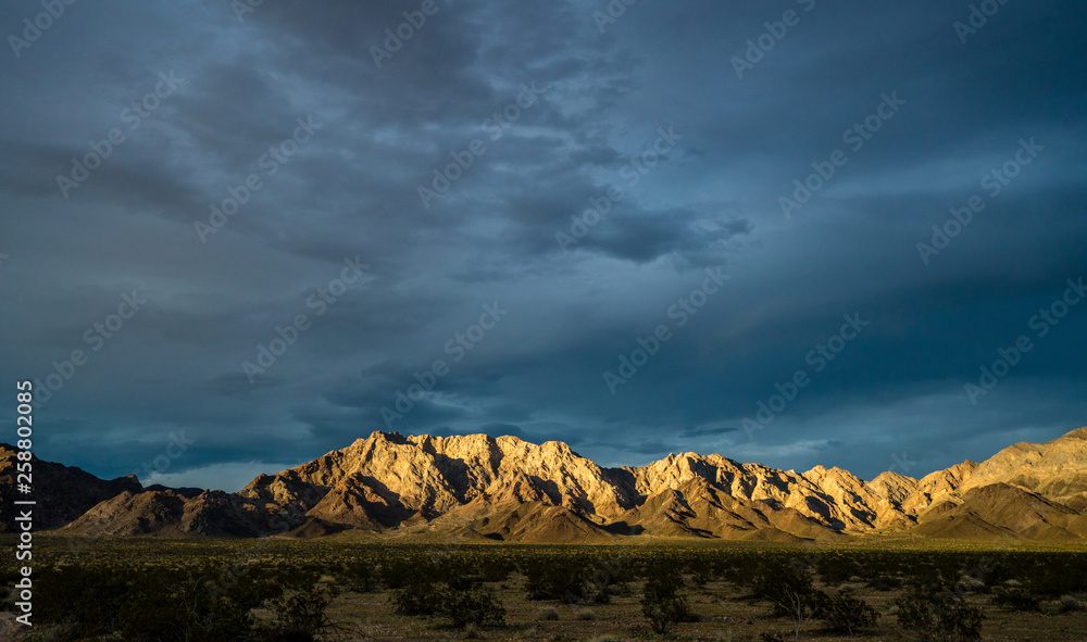 Mountain range in golden light in the Mojave desert near cadiz Ca. 