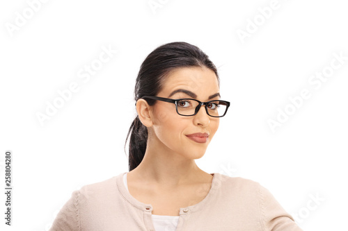 Portrait of a young brunette with glasses