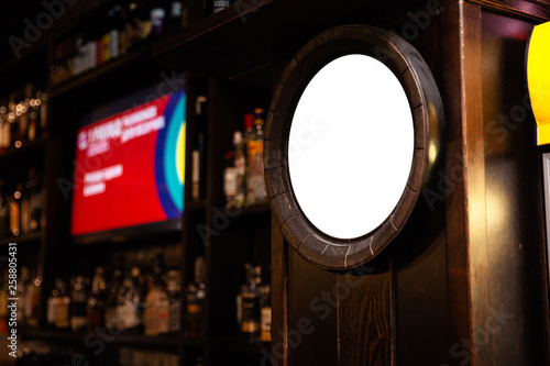Blank ad Mock up frame on the blurred background of the bar - Empty space for advertisement