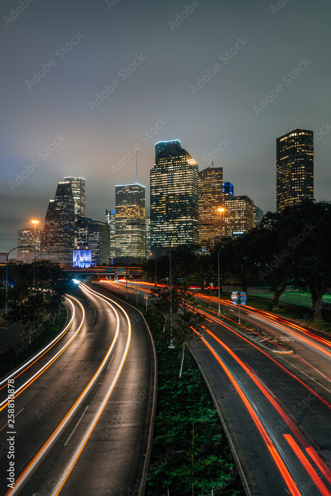 Long exposure of traffic on Allen Parkway and the Houston skyline at night, in Houston, Texas