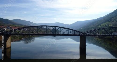 Flying over the Douro River with traditional rabelo boats at the village of Pinhao, in Portugal