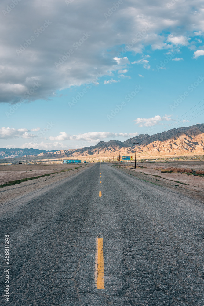 Road and mountains in the desert near Niland, California