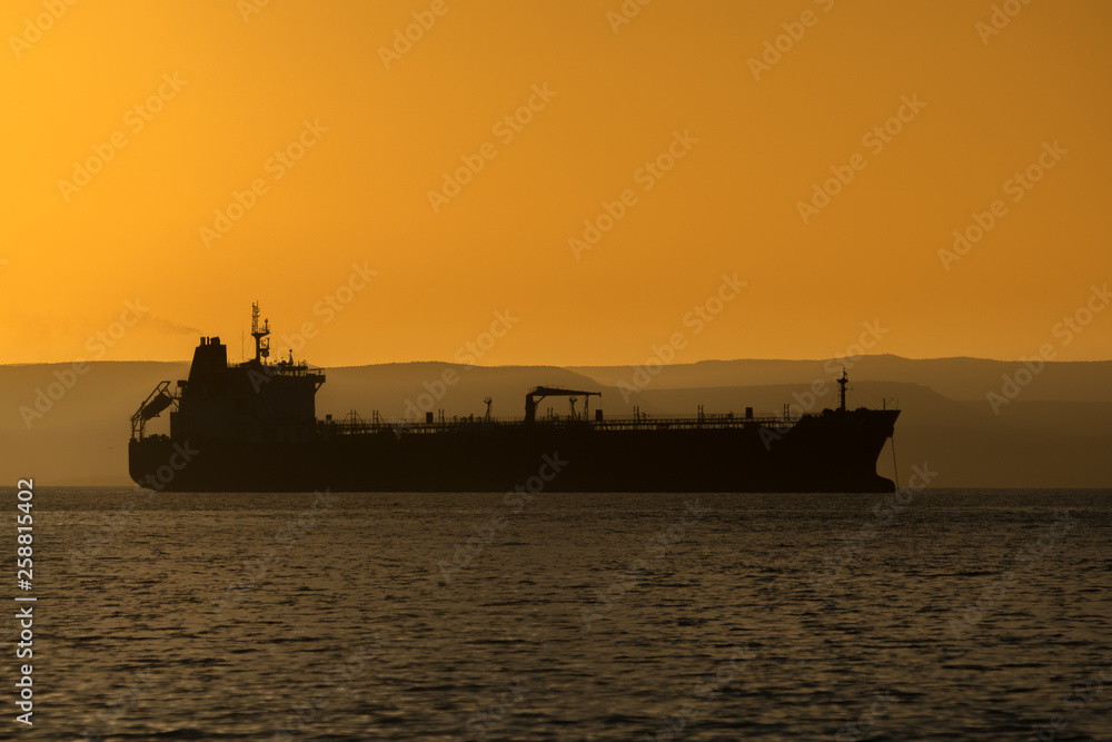 a Tanker waits of shore in La Paz Mexico to provide fuel for the local electric plant.