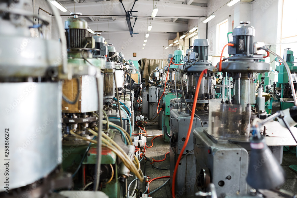 Background image of complex mechanical units in workshop of modern factory, copy space Background image of complex mechanical units in workshop of modern factory, copy space