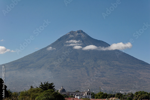 The Agua Volcano, a prominent stratovolcano visible throughout the city of Antigua in southern Guatemala.