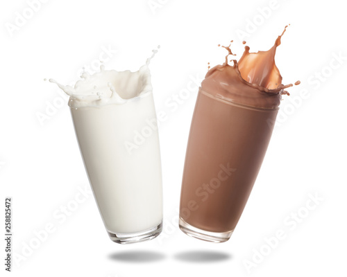 Milk and chocolate milk splashing out of glass isolated on white background.