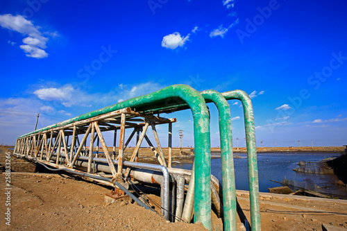 Oil pipelines and valves, industrial equipment © pdm
