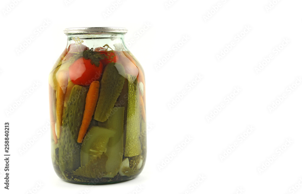 glasses jar with pickled vegetables, traditional russian marinated vegetarian meal for winter, copy space on the right glasses jar with pickled vegetables, traditional russian marinated vegetarian meal for winter, copy space on the right