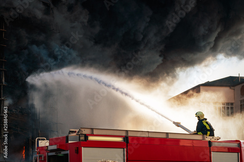 Firefighters extinguish a fire