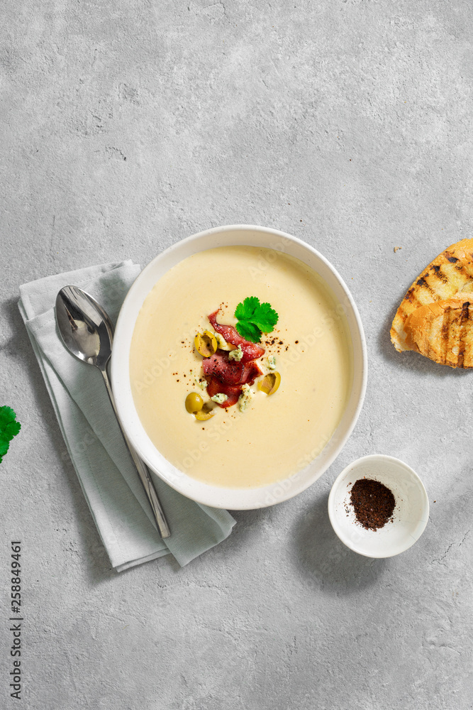 Bowl cheese soup bacon olives top view Bowl cheese soup bacon olives top view
