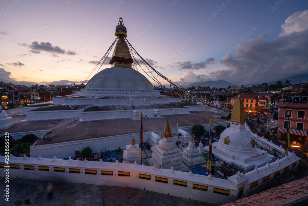 Boudhanath stupa, landmark and sacred place in Kathmandu city at sunset, Nepal