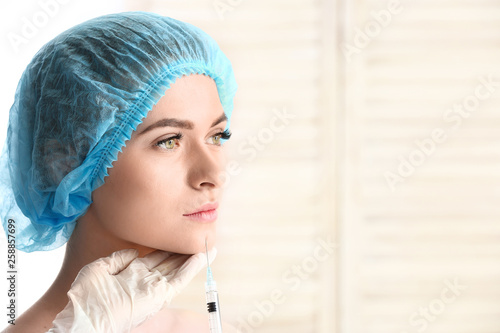 Young woman receiving fille...