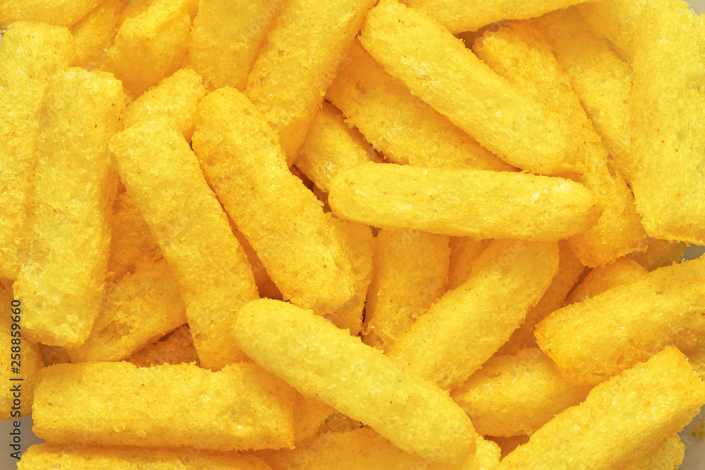 Cheese puffs, Colorful Cheetos. Close up shot of Cheese puffs, background texture Cheese puffs, Colorful Cheetos. Close up shot of Cheese puffs, background texture