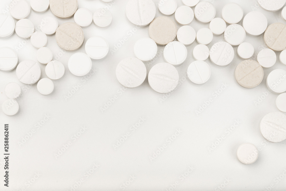 white tablets close up background on white desk - Image white tablets close up background on white desk - Image