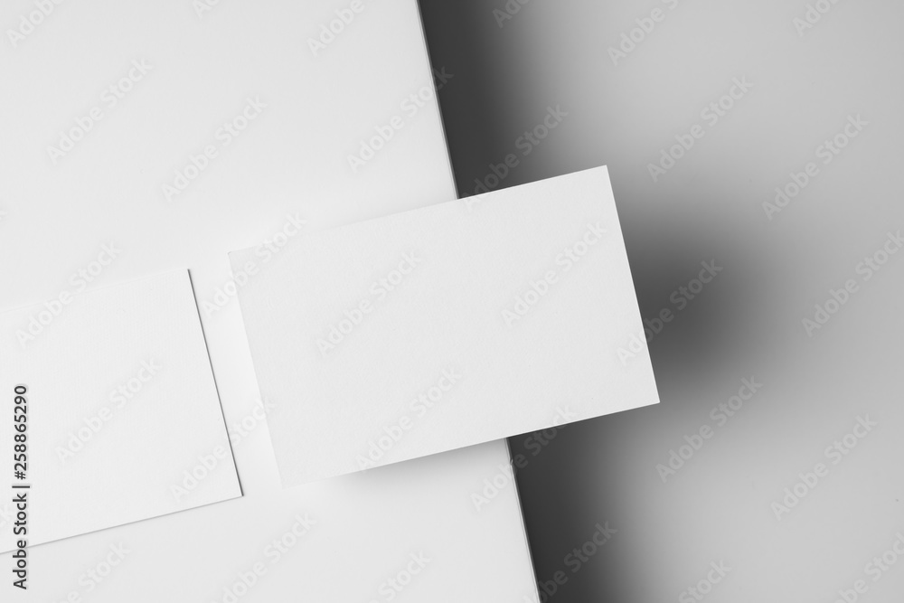 top view of 2 business card isolated on white top view of 2 business card isolated on white