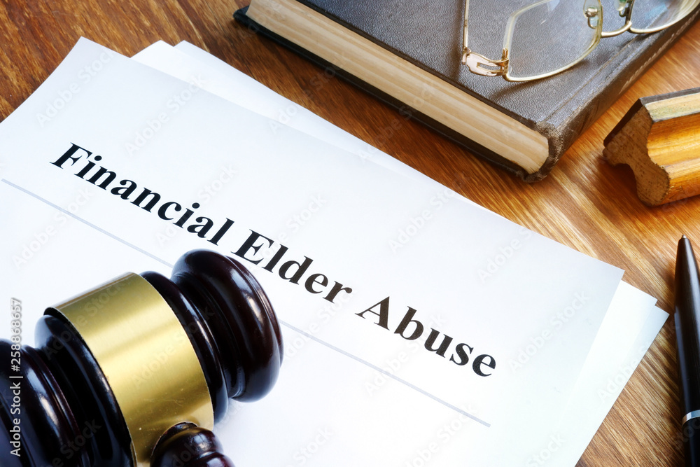 Wall Mural Financial Elder Abuse report and gavel in a court.