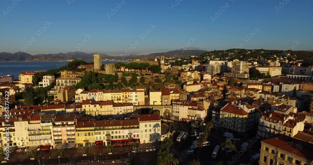 Aerial view of Cannes downtown with castle at sunset Aerial view of Cannes downtown with castle at sunset