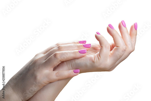 Beauty woman hands with pink fashion manicure. Isolated image