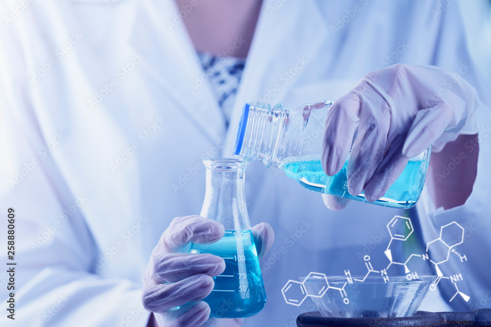 Investigator scientist hand checking test tubes, dropping liquid to test tube. , close Investigator scientist hand checking test tubes, dropping liquid to test tube. , close