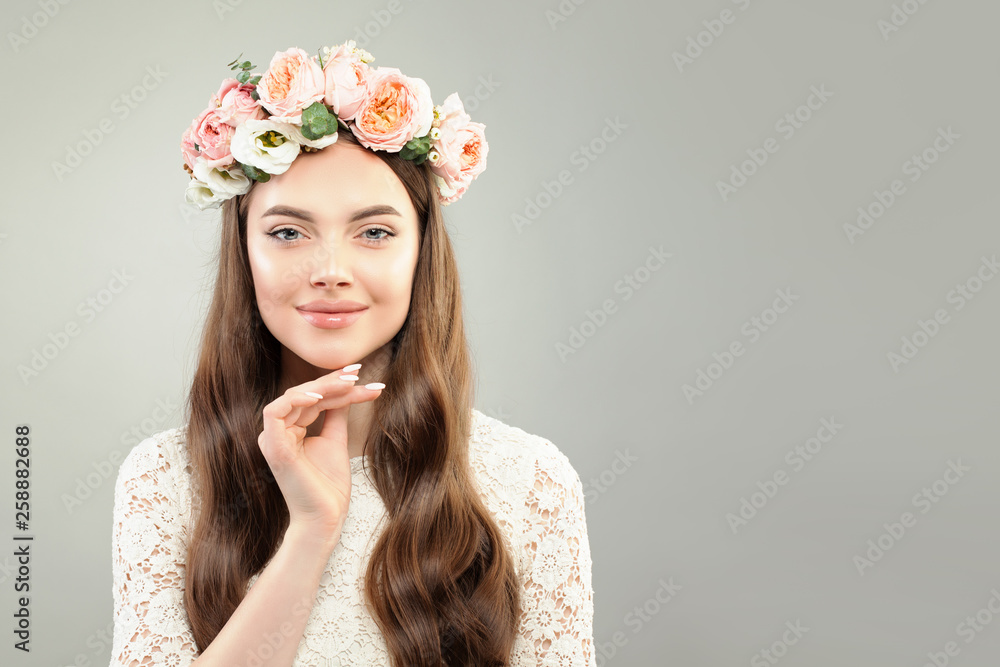 Healthy Model Woman with Clear Skin, Curly Hair, Makeup and Rose Flowers Wreath Healthy Model Woman with Clear Skin, Curly Hair, Makeup and Rose Flowers Wreath