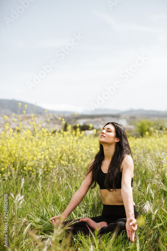 yoga in spring with nice woman