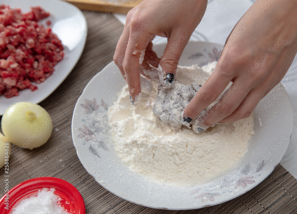 Fototapeta premium Minced meatballs in the kitchen
