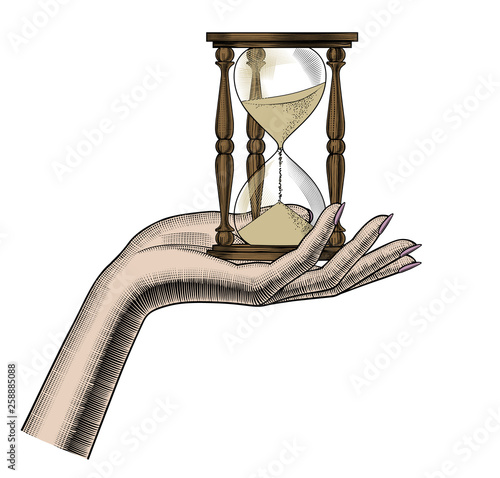 Concept of passing time. Female hand with a retro hourglass. Vintage engraving stylized drawing. Vector Illustration